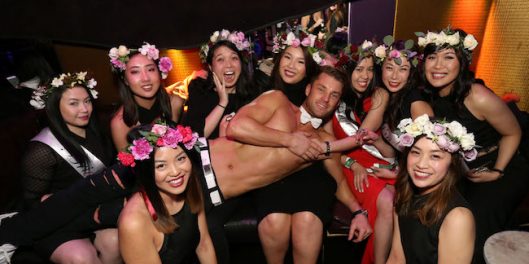 male stripper with hens party women